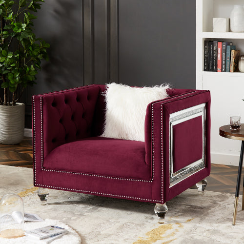 Single red velvet sofa