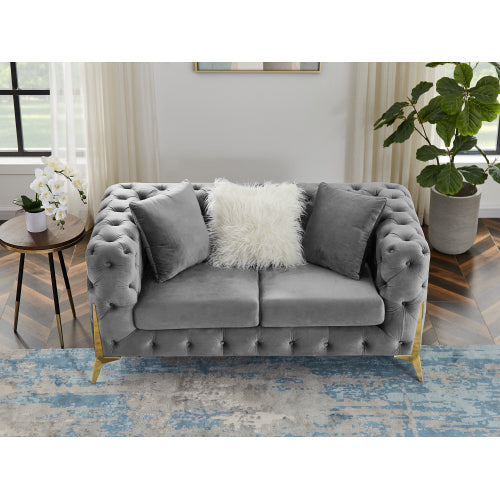 Two-seater grey velvet sofa